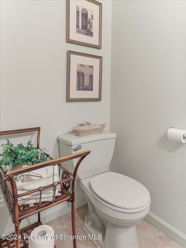 bathroom featuring toilet