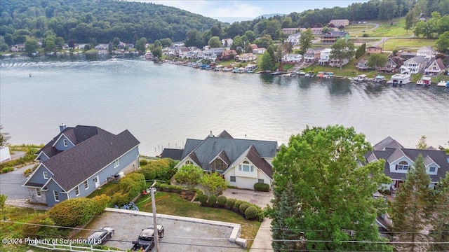 drone / aerial view with a water view