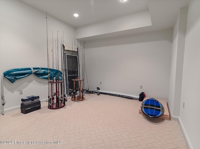 workout room with light carpet