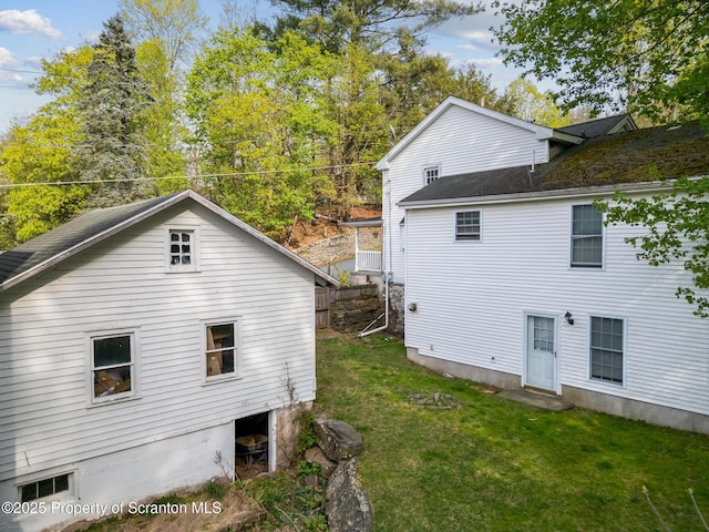 408 Chestnut Ave, Hawley, PA 18428 - view of side of home featuring a lawn