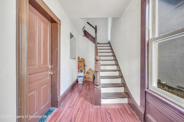 foyer entrance with hardwood / wood-style flooring