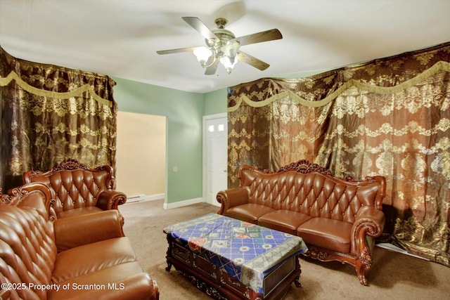 228 Pittston Ave, Scranton, PA 18505 - carpeted living area with a baseboard heating unit, a ceiling fan, and baseboards