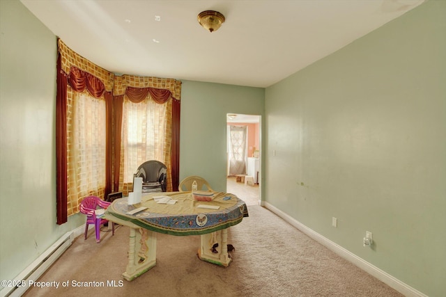 228 Pittston Ave, Scranton, PA 18505 - dining room with a baseboard heating unit, carpet flooring, and baseboards