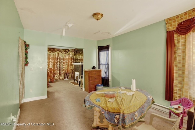 228 Pittston Ave, Scranton, PA 18505 - dining area with carpet and baseboards