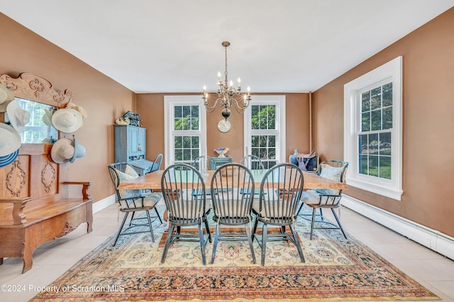 tiled dining space with an inviting chandelier and a baseboard heating unit