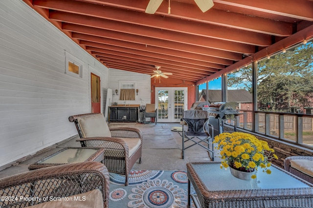 view of patio featuring ceiling fan