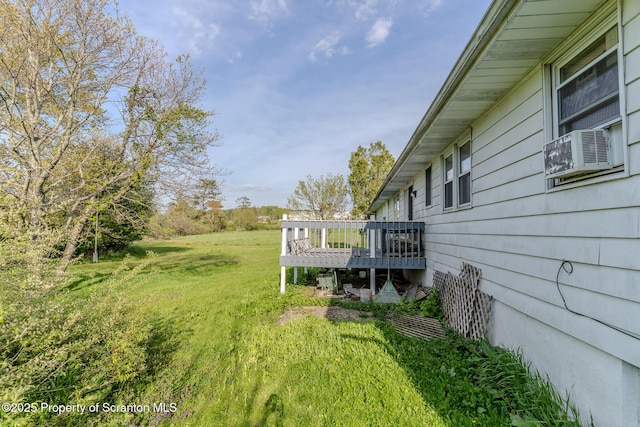 505 Yedinak Ln, Madison Twp, PA 18444 - view of green lawn with a wooden deck and cooling unit