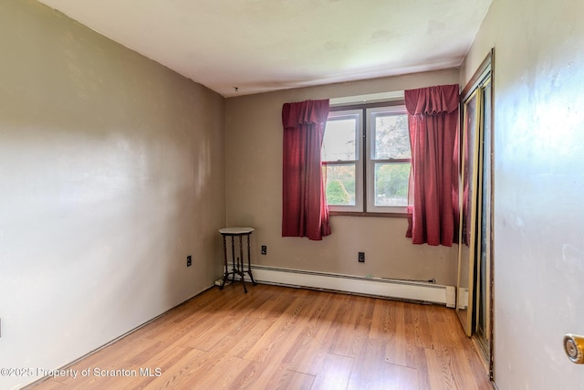 505 Yedinak Ln, Madison Twp, PA 18444 - empty room featuring baseboard heating and light wood-style flooring