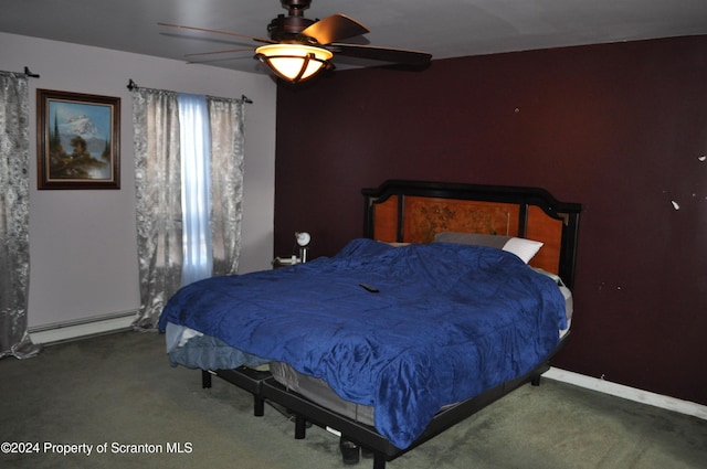 bedroom featuring ceiling fan, carpet floors, and a baseboard heating unit