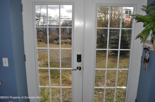 entryway featuring french doors