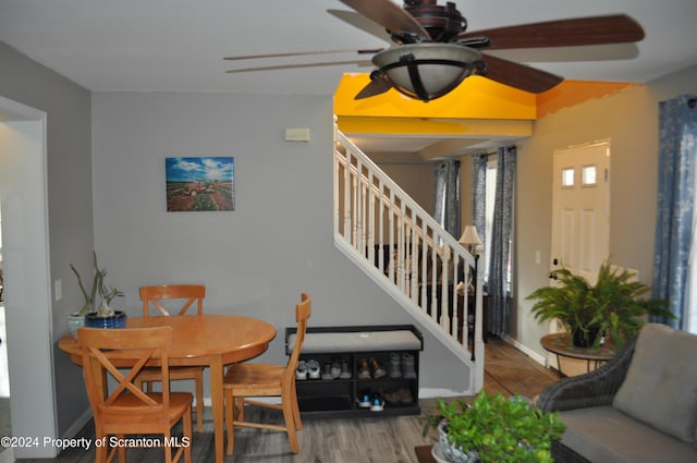 dining space featuring ceiling fan and hardwood / wood-style floors