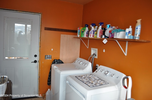 washroom featuring separate washer and dryer