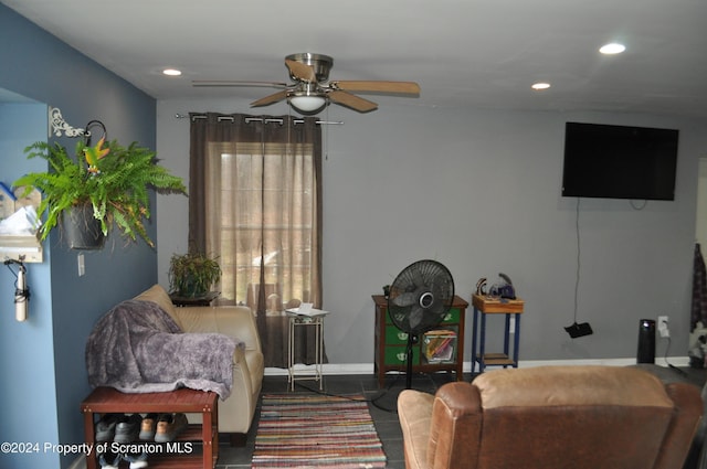 living room featuring ceiling fan