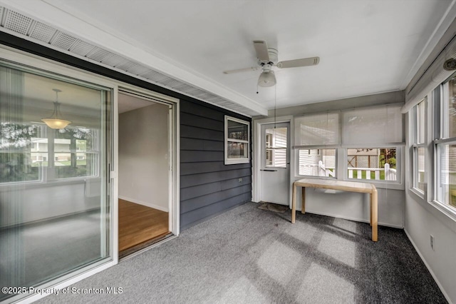 unfurnished sunroom with plenty of natural light