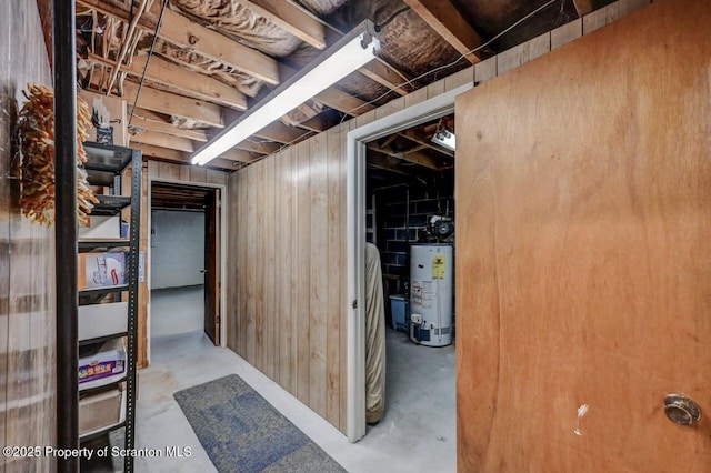 unfinished basement with water heater