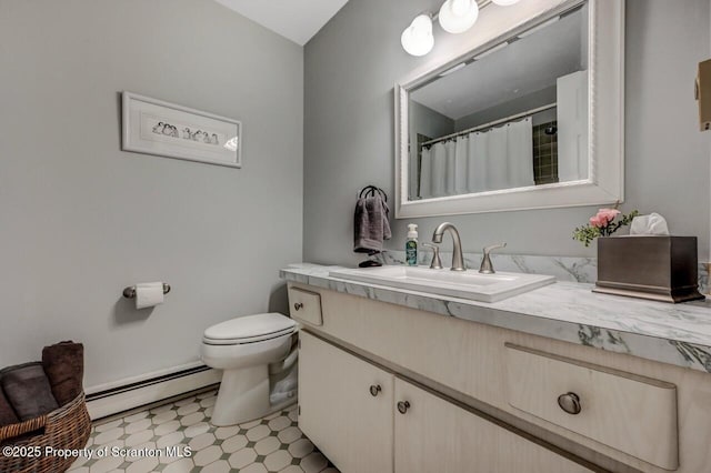 full bath featuring vanity, tile patterned floors, a baseboard heating unit, and toilet