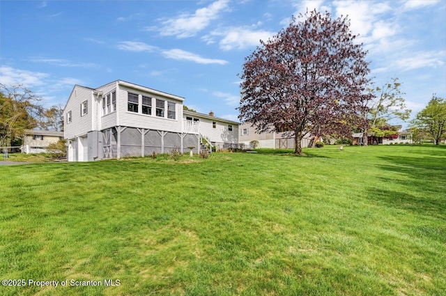 view of yard with an attached garage