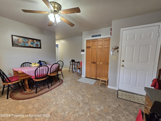 dining area with ceiling fan