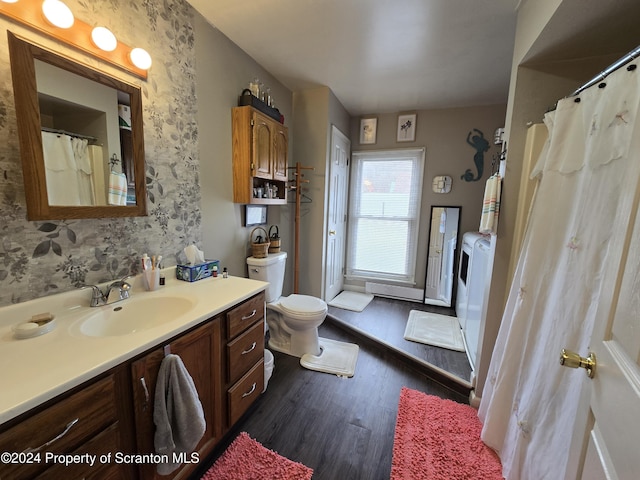 bathroom featuring hardwood / wood-style floors, vanity, and toilet