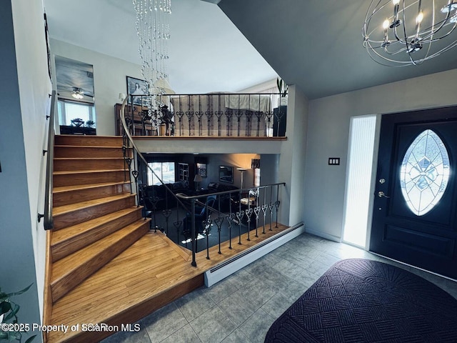 entryway featuring stairs, a baseboard radiator, and an inviting chandelier