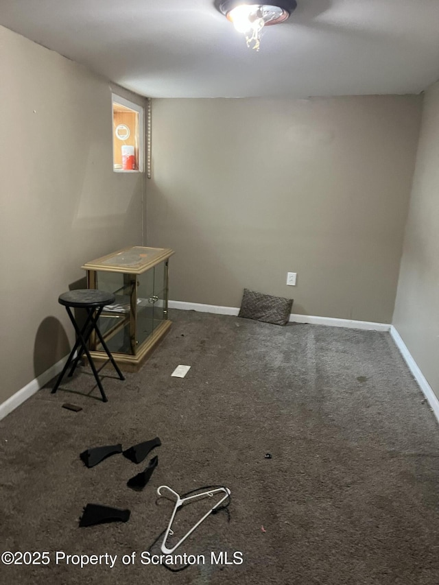 interior space featuring dark colored carpet