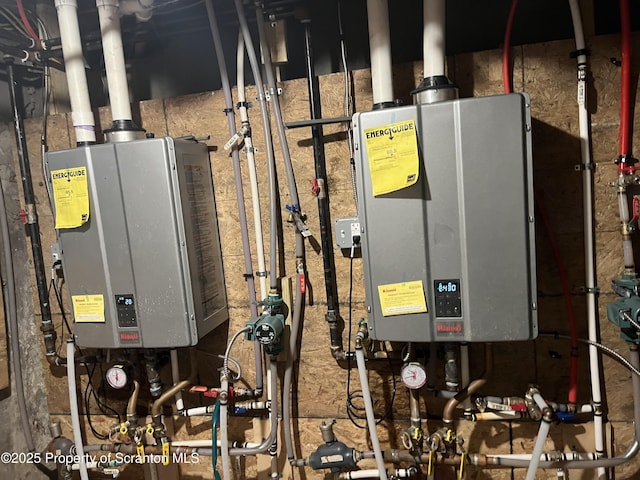 utility room featuring tankless water heater