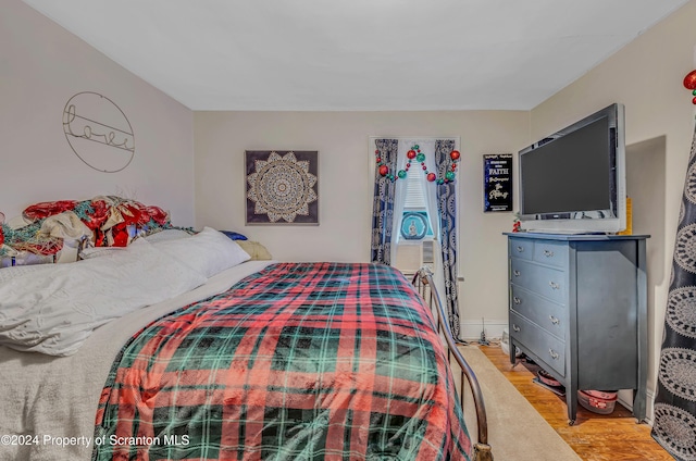 bedroom featuring light wood-type flooring