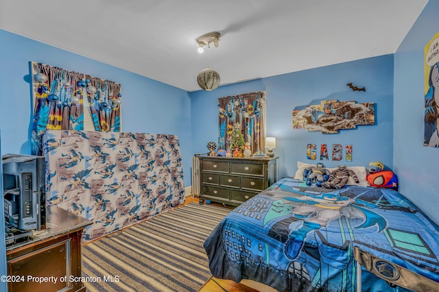 bedroom featuring carpet flooring