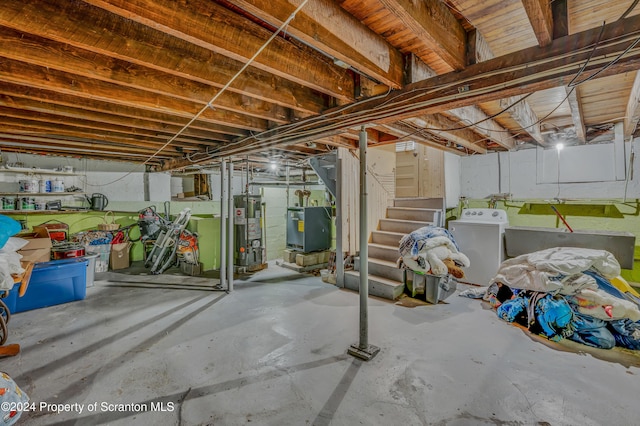 basement featuring washer / dryer and gas water heater