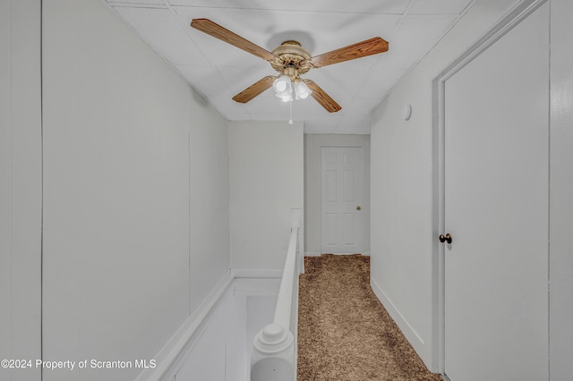 corridor featuring carpet flooring