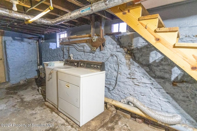 laundry area featuring washing machine and dryer