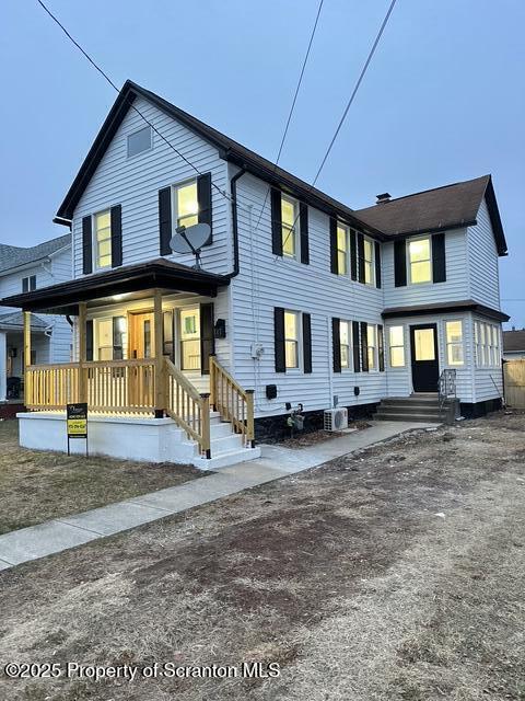 view of front facade featuring covered porch