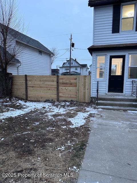 view of yard covered in snow