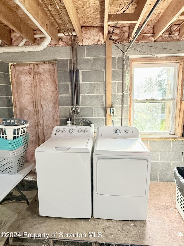 laundry area with washer and dryer