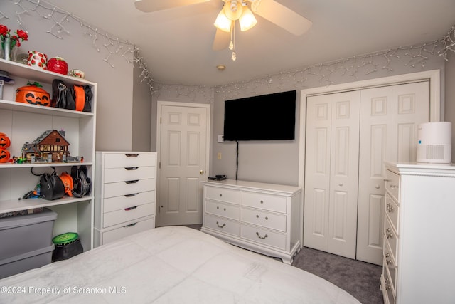 bedroom featuring carpet, a closet, and ceiling fan