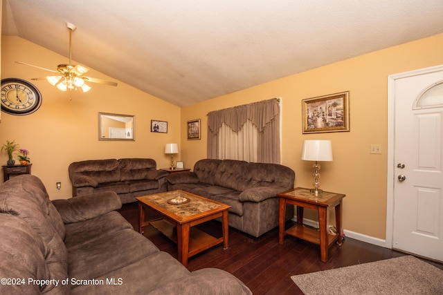 living room with dark hardwood / wood-style floors, vaulted ceiling, and ceiling fan