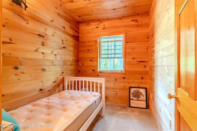 977 Laurel Ln, Kingsley, PA 18826 - bedroom featuring a relaxing sauna, wooden walls, wooden ceiling, and carpet floors