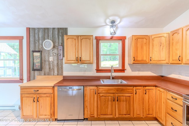 977 Laurel Ln, Kingsley, PA 18826 - kitchen with stainless steel appliances, backsplash, and light tile patterned floors