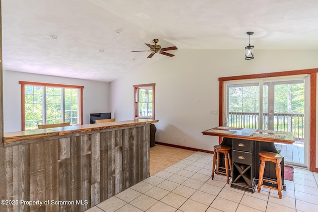 977 Laurel Ln, Kingsley, PA 18826 - kitchen featuring vaulted ceiling, ceiling fan, and light tile patterned floors