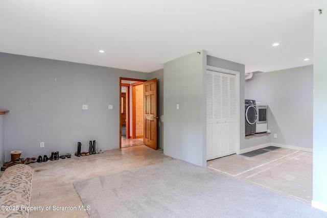 977 Laurel Ln, Kingsley, PA 18826 - unfurnished living room featuring washer and clothes dryer, recessed lighting, and carpet flooring