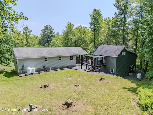977 Laurel Ln, Kingsley, PA 18826 - rear view of house featuring a yard