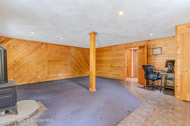 977 Laurel Ln, Kingsley, PA 18826 - unfurnished office featuring a wood stove, wood walls, and recessed lighting