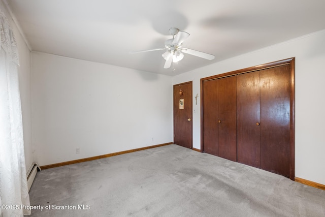 5 Patti Ann Dr, Scott Twp, PA 18433 - unfurnished bedroom with carpet flooring, ceiling fan, a closet, and a baseboard heating unit