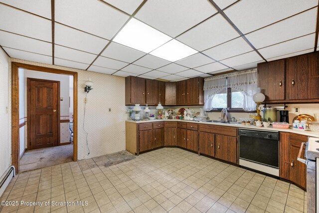 5 Patti Ann Dr, Scott Twp, PA 18433 - kitchen with dishwasher, light countertops, a baseboard radiator, a paneled ceiling, and range