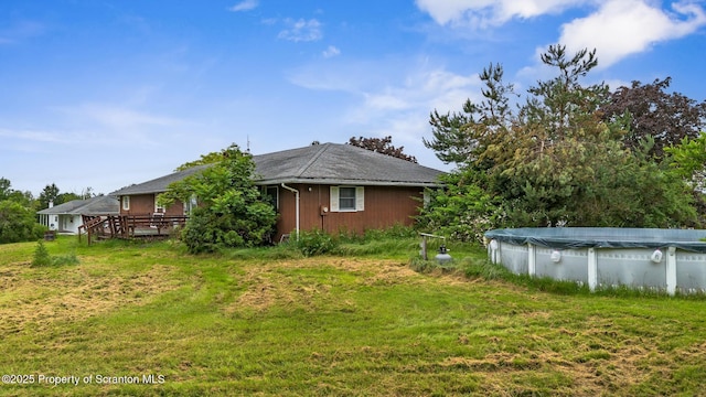 5 Patti Ann Dr, Scott Twp, PA 18433 - rear view of house with a covered pool and a yard