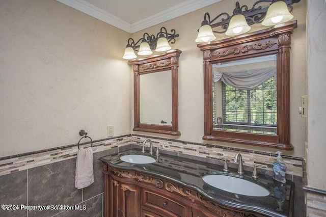 bathroom with decorative backsplash, crown molding, vanity, and tile walls