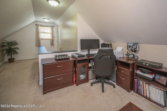 office featuring light carpet and lofted ceiling