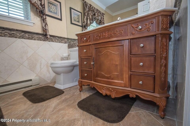 bathroom featuring a baseboard heating unit, toilet, tile walls, and ornamental molding