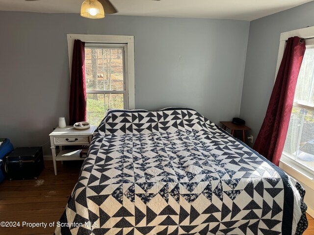 bedroom featuring wood finished floors