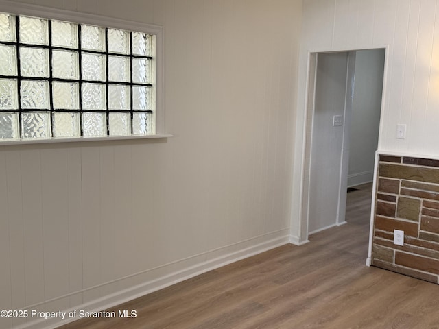 spare room featuring hardwood / wood-style flooring